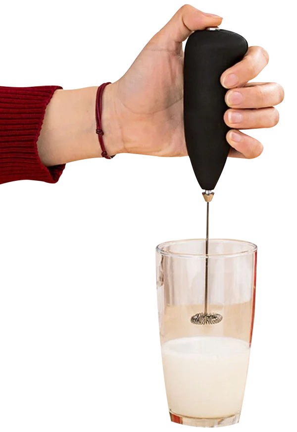 Handheld Milk Frother in Glass of Milk PNG Transparent
