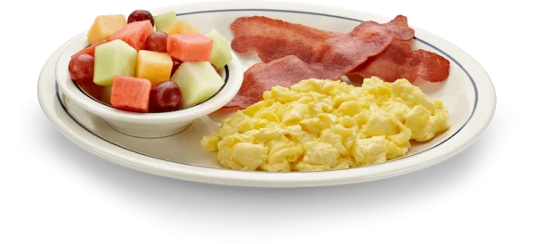 Breakfast Plate with Scrambled Eggs, Bacon, and Fruit Salad PNG