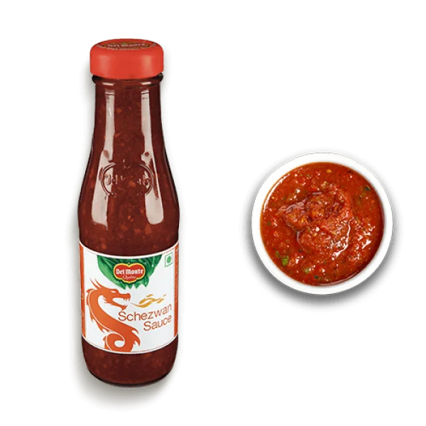 Del Monte Schezwan Sauce Bottle and Bowl PNG Transparent