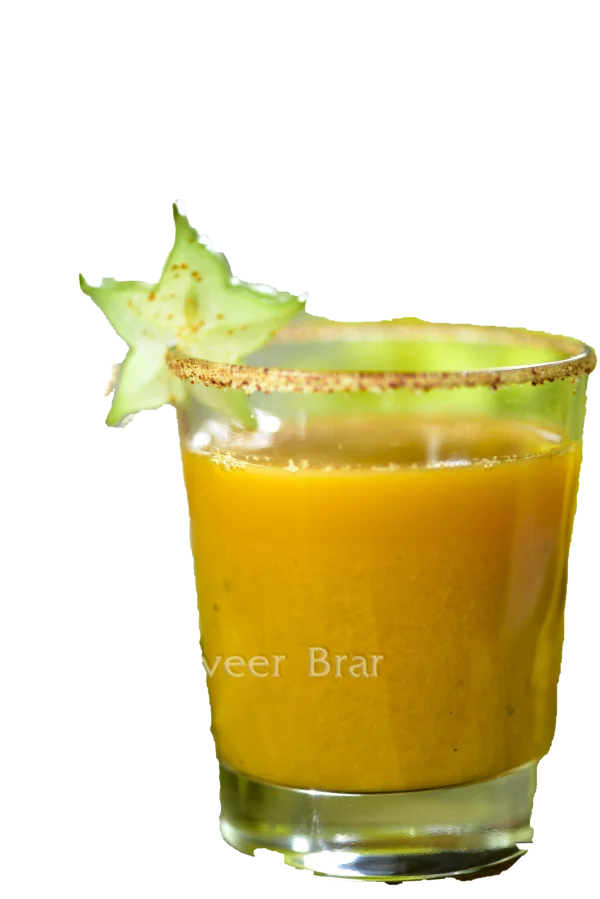 Tropical Orange Drink with Star Fruit Garnish PNG
