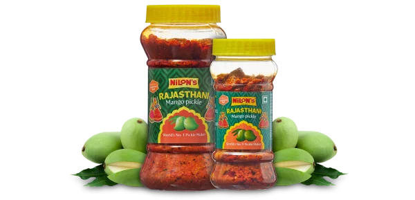 Nilon's Rajasthani Mango Pickle Jars with Fresh Mangoes PNG