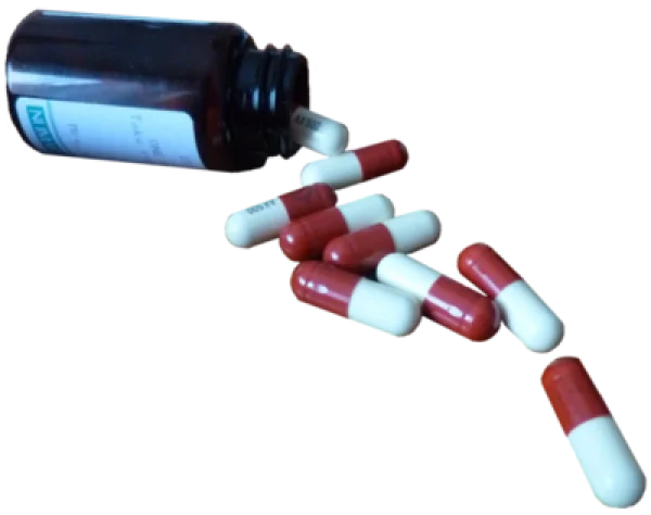 Medicine Bottle with Spilled Capsules PNG Transparent