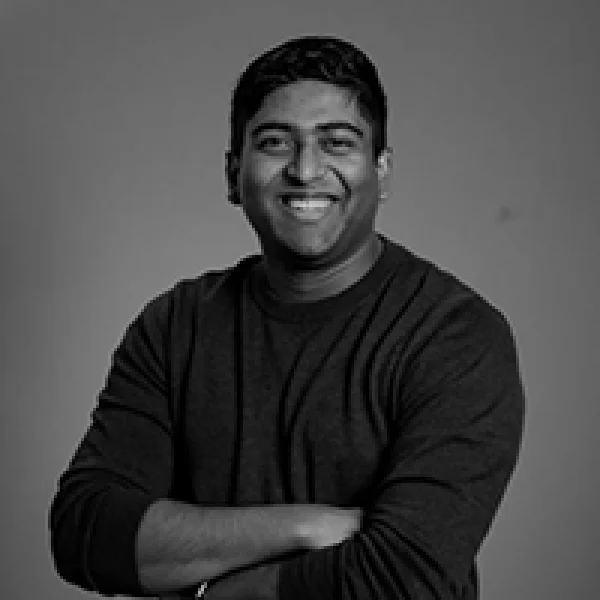 Smiling Man with Crossed Arms Black and White Portrait PNG